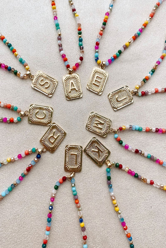 Multi colored beaded initials necklace